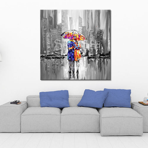 Couple with umbrella in gray and silver environment