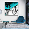Woman painting with turquoise hat
