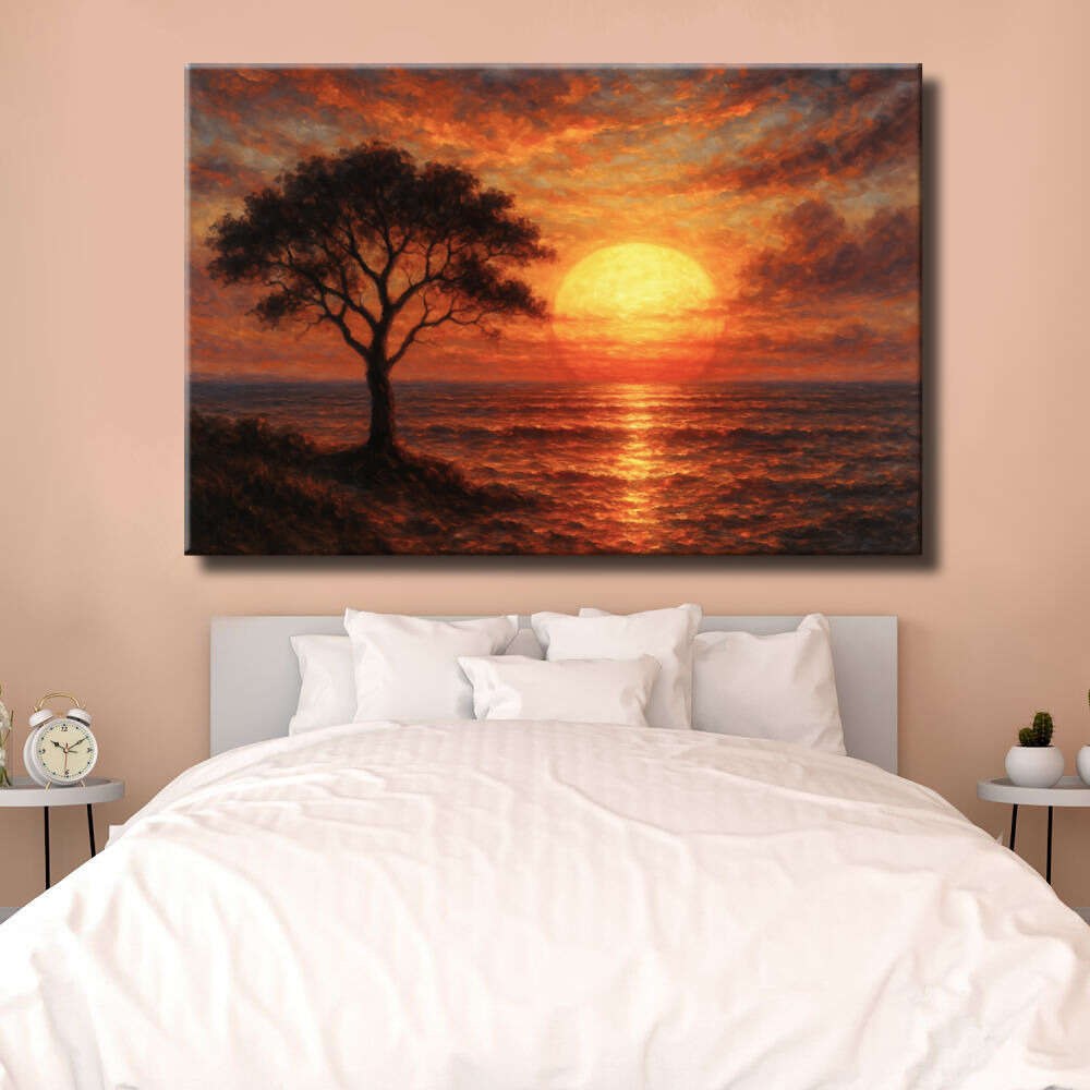 Árbol al atardecer sobre el mar